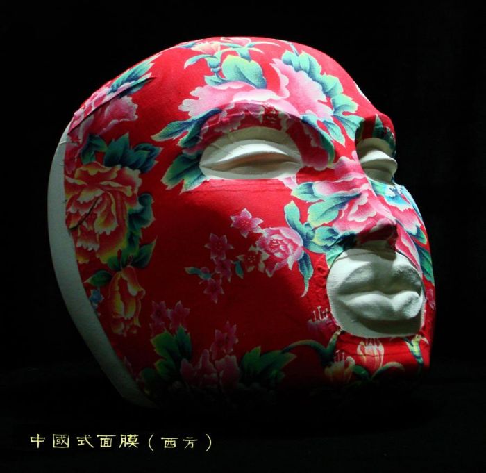 Li Jinxian Bildhauerei - Chinesische Maske